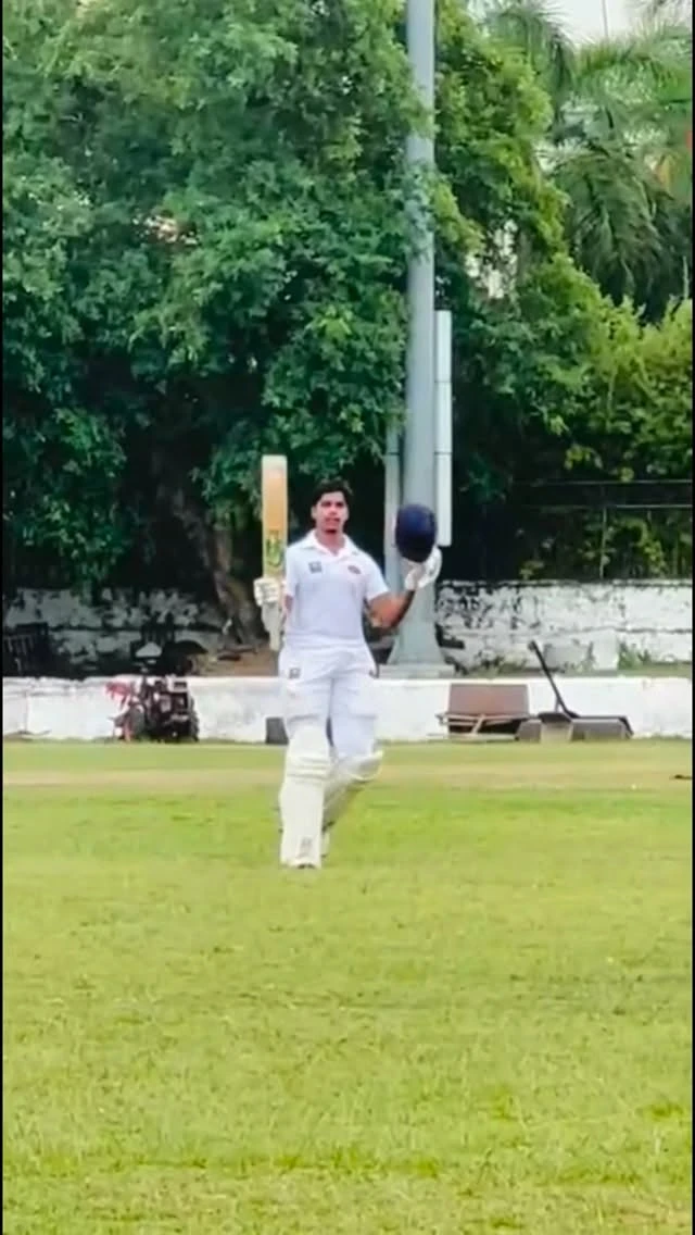Linal Subasinghe raising his bat after his Under-23 semi-final century