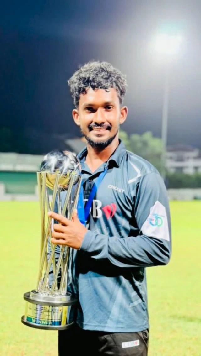 Navindu holding the trophy after the 2026 MCA T10 Tier A championship